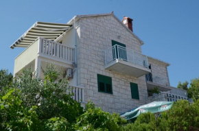 Apartments with a parking space Postira, Brac - 22207